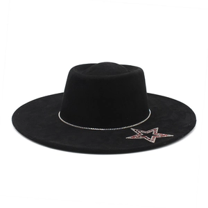 Detail of black wide brim jazz hat with rhinestone chain and red crystal star accent