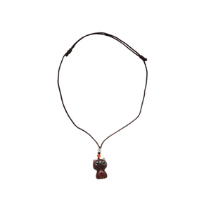 Handcrafted wooden cat pendant necklace with adjustable woven cord for a cute minimalist look