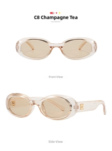 Detail of vintage oval champagne tea sunglasses with golden metal logo on the frame