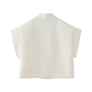 Minimalist white sleeveless cropped puffer vest with horizontal pleated texture on white background
