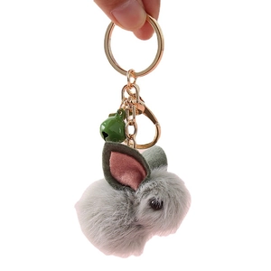 Cute grey plush rabbit keychain with golden metal ring and small green bell accessory