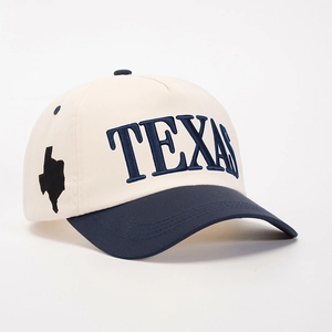 Close-up of Texas embroidery and map outline on two-tone cotton twill baseball cap