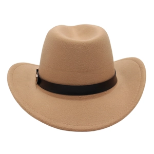 Detail of camel western cowboy felt hat with black leather band and gold buckle