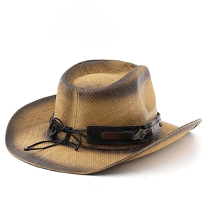 Macro shot of woven cowboy hat brim with distressed texture and leather band details