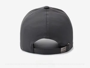 Detail view of the adjustable strap and metal buckle on the dark grey baseball cap