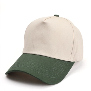 Detail view of five-panel baseball cap with off-white crown and forest green brim