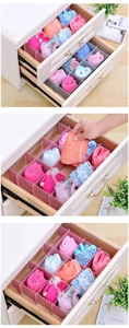 Detail view of pink and grey DIY adjustable drawer dividers for socks and underwear