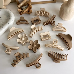 Elegant matte hair claws collection in milk tea and coffee colors for women's styling