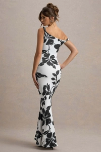 Rear view showing the floral pattern and slim fit design of the printed maxi dress