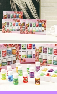 Detailed display of assorted water-soluble essential oil sets with floral box packaging
