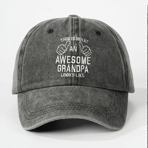 Detail of charcoal grey washed cotton baseball cap with white printed typography