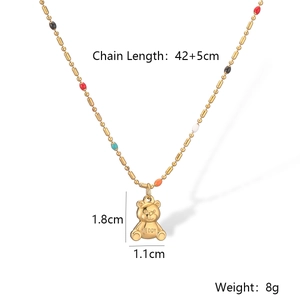 Detail of golden teddy bear pendant with size dimensions and colorful bead chain