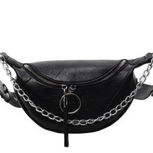 Vintage black textured leather saddle bag with silver chain strap and metal hardware