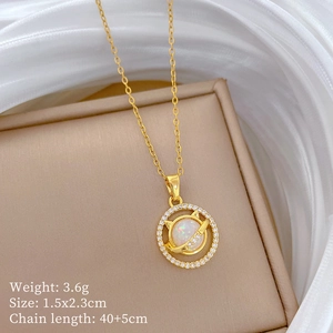 Golden planet necklace specifications with weight 3.6g and pendant size 1.5x2.3cm detail