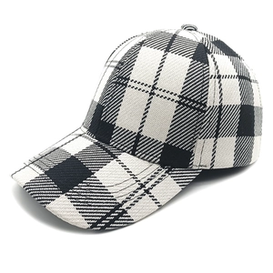 Classic black and white checkered baseball cap with curved brim in side view profile