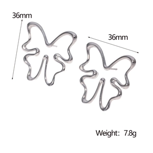 Macro view of butterfly earrings showing 36mm size and 7.8g weight parameters