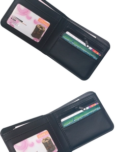 Detail of the black wallet interior showing multiple card slots and a clear ID window