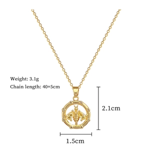 Detailed view of a gold bee pendant necklace with dimensions 2.1cm and 40+5cm chain