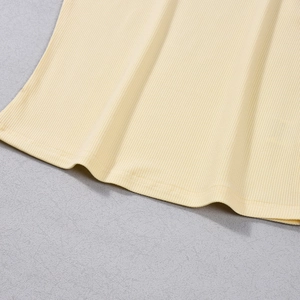 Detail of high-stretch ribbed knit hem with professional double-needle stitching in cream