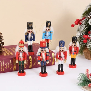 Set of six wooden Nutcracker Christmas ornaments with gold hanging strings for holiday decor
