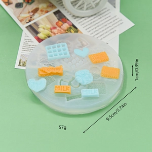 Silicone mold with cookie and cheese shapes including milk and heart designs