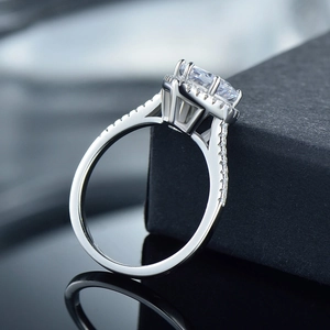 Luxurious S925 sterling silver heart-shaped zircon ring on a sleek black reflective surface