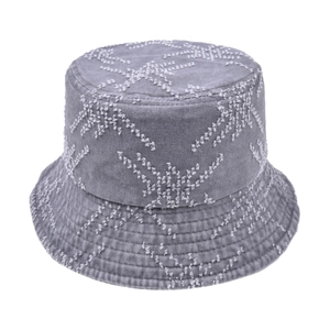 Close-up of distressed grey bucket hat featuring white star embroidery and premium stitching