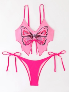 Close-up of pink butterfly-shaped bikini top with vibrant magenta tie-side bottoms