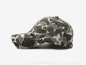 Side view of washed camouflage baseball cap showing reinforced stitching on the brim