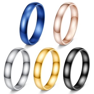 Detail of 4mm polished minimalist rings in blue, gold, rose gold, silver and black