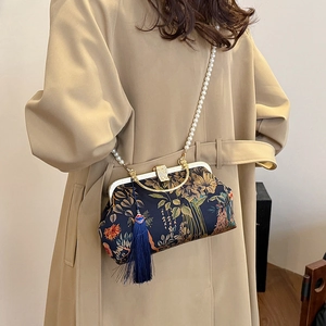 Vintage navy floral handbag with pearl chain and tassel, perfect for Cheongsam style