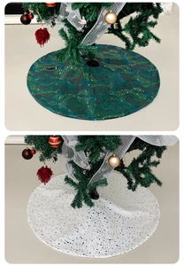 Detailed top view of gold-stamped Christmas tree skirts in green and white star patterns