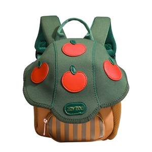 Cartoon forest green kindergarten backpack for kids with red apple patch on white background