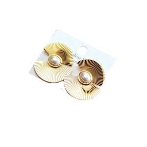 Elegant gold fan-shaped flower earrings with white pearl center on jewelry card