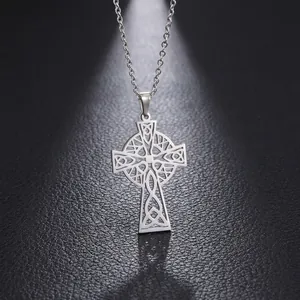 Polished stainless steel Celtic cross pendant necklace with hollow knot design on black background