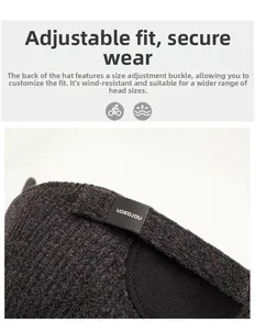 Detail of adjustable strap and buckle on thermal winter baseball cap with knit texture