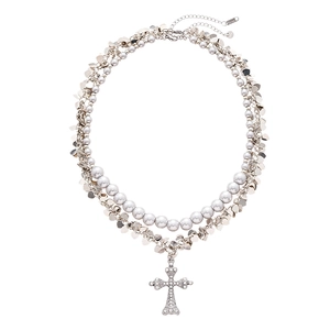 Silver multi-layer necklace set with faux pearls and rhinestone cross pendant on white back