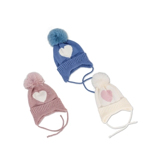 Pink, blue, and beige knit baby hats with heart patterns and soft pom-poms on top