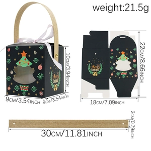 Elegant black Christmas gift box with tree patterns, white ribbon, and wooden handle