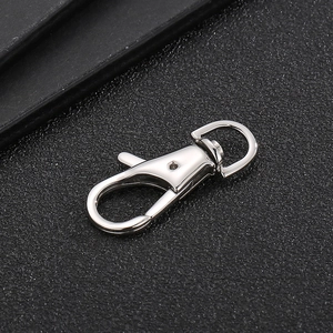 High-quality close-up detail of a silver stainless steel swivel lobster clasp for jewelry