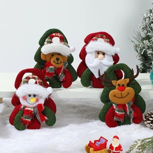 Set of Christmas fabric gift bags featuring Santa, snowman, and reindeer on white shelves