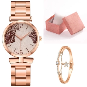 Rose gold quartz watch for women with palm leaf dial pattern and matching star bracelet set