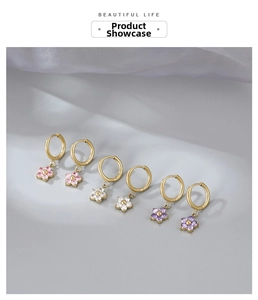 Detailed set of floral hoop earrings with pink, white, and purple zircon flower charms