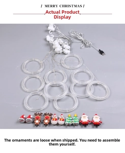 Detail of Christmas LED ring lights with USB plug and cartoon holiday character pendants
