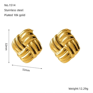 Macro detail of 18k gold-plated stainless steel earrings with square woven texture