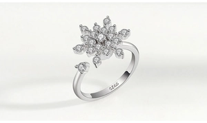 Macro shot of silver snowflake spinner ring with sparkling cubic zirconia and S925 hallmark