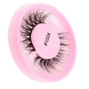 Detail of glue-free black false eyelashes model 103A in a pink round storage tray