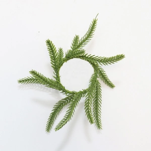 Top view of Norfolk pine PE needle wreath for wine bottle decoration and candle ring