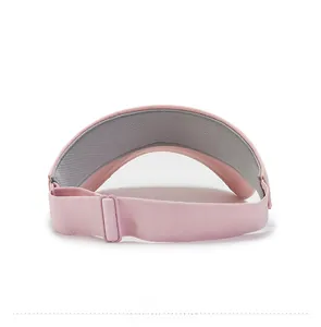 Close-up of pink sun visor back with elastic SPORTS strap and breathable mesh lining