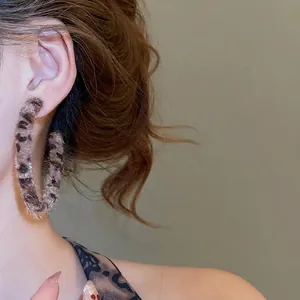 Vintage leopard print plush hoop earrings with geometric C-shape design for women